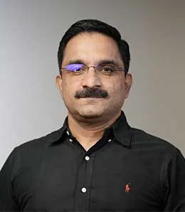 Mohan Thomas, Director & Chief Executive Officer at XE.com